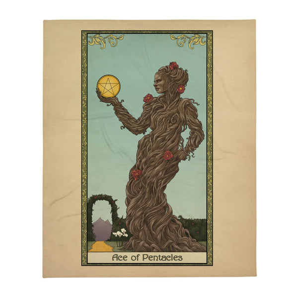 A blanket featuring art of the Ace of Pentacles from the Tabletop Tarot deck. An twisting tree elemental grows up from the ground, a hand held up holding a large gold coin with a star in the middle. A decorative border frames the art with the words "Ace of Pentacles" at the bottom.
