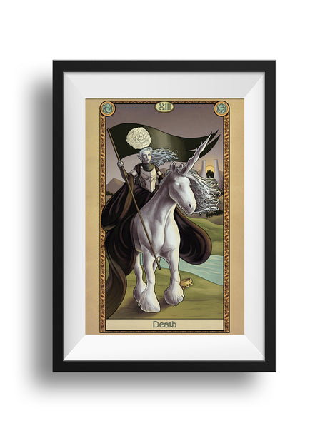 A framed print of a pale armored figure riding atop a unicorn. She holds aloft a black banner with a white rose on it. Her gown drapes down to the ground, where a crown lays on the grass. The art is surrounded by a decorative border with the word "Death" at the bottom.