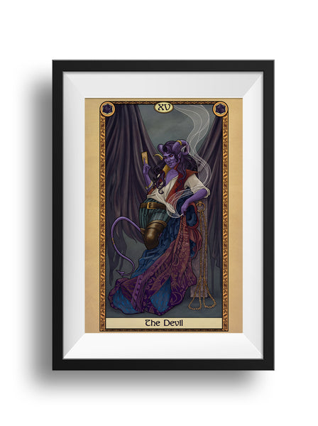 A framed art print of The Devil card from the Tabletop Tarot. A horned figure stands leaning on a stone column with chains hanging from it, and an ornate coat draped over it. In one hand, the figure holds a cigarette with smoke rising. In the other hand is a card between his fingers. In the background, tattered drapes hang, like tattered wings.