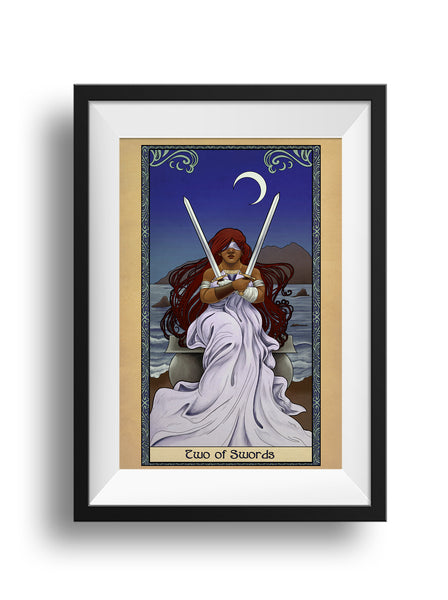 A framed print of a dwarven woman sitting on a stone bench before a large body of water, with land in the distance. She holds up two swords, crossed before her. Behind her is a dark sky with a crescent moon. The art is surrounded by a decorative border with the words "Two of Swords" at the bottom.